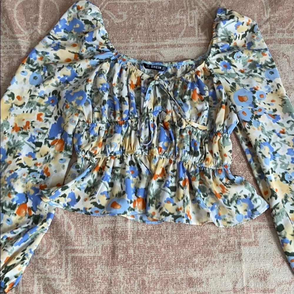 Super cute yellow and blue floral peasant top!